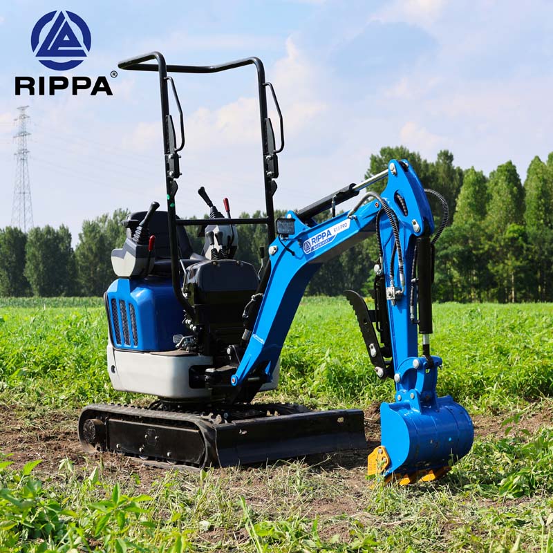 Blue Rippa R13 mini excavator on a field